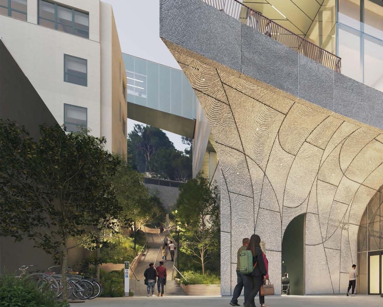 To the left of the arching entrance of the building, a staircase lined with trees moves upward toward Mount Sutro.