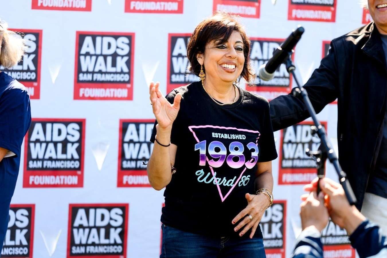 woman speaks during kick-off