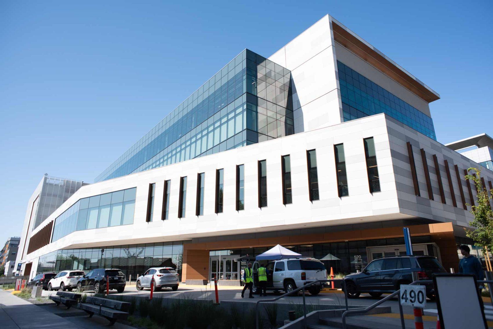 An exterior shot of the UCSF Bayfront Medical Building, showing a modern design featuring metallic panels and glass.