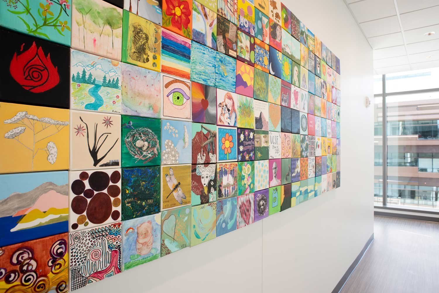 A collection of small canavses featuring art by UCSF staff and patients with the theme “hope, healing and gratitude.”
